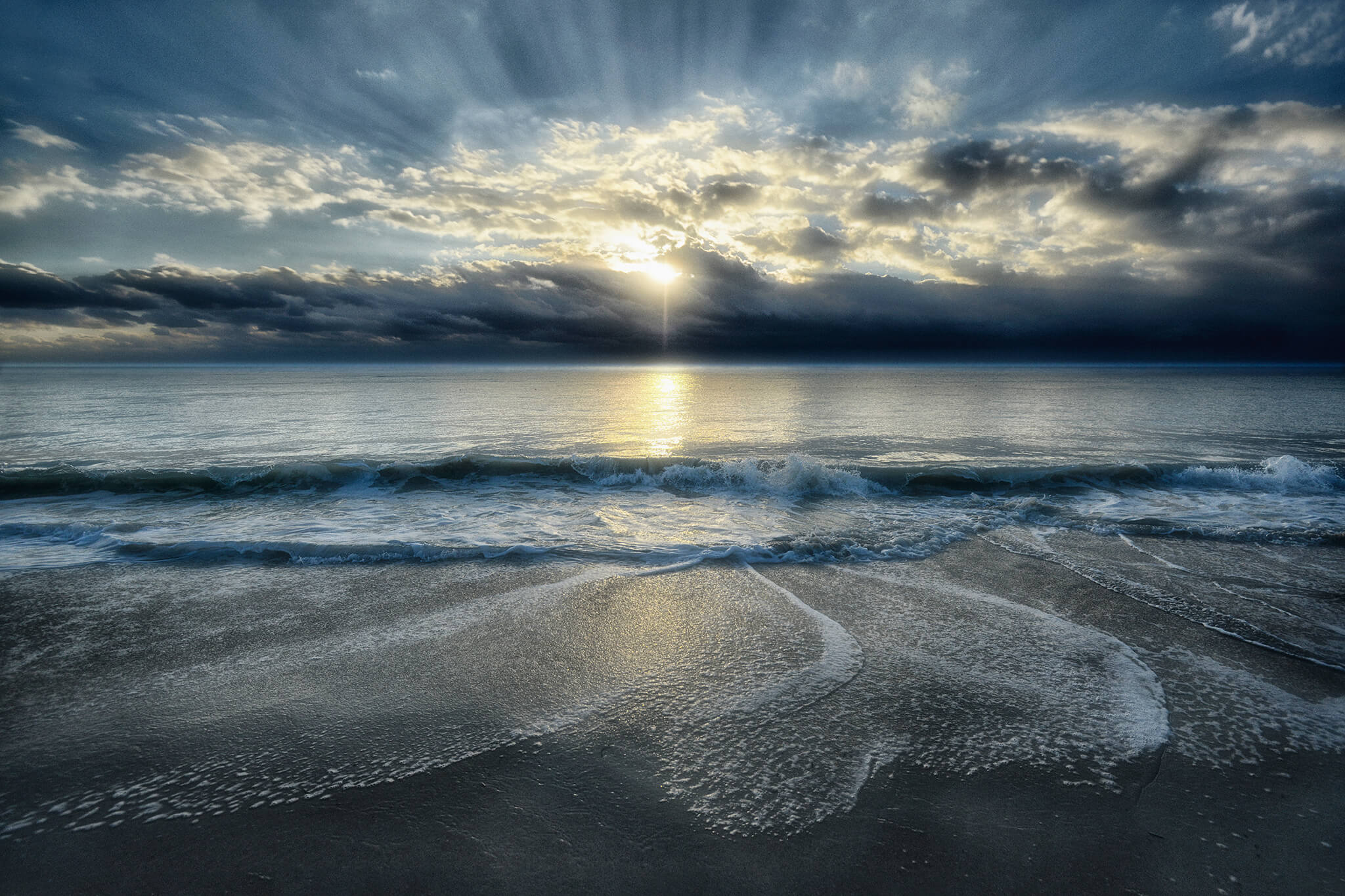 Godbeams of light through clouds.