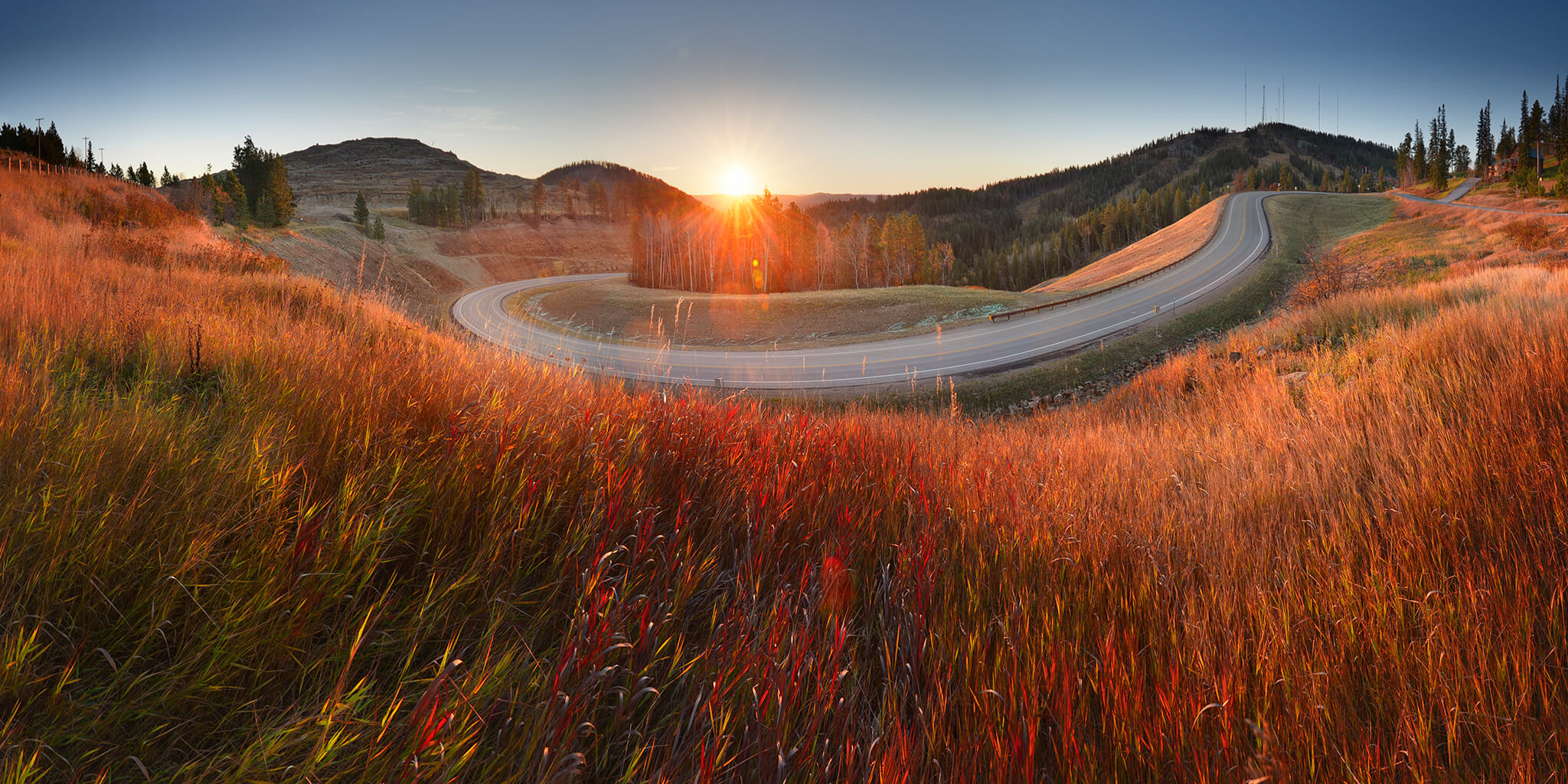Picture of winding road sunrise