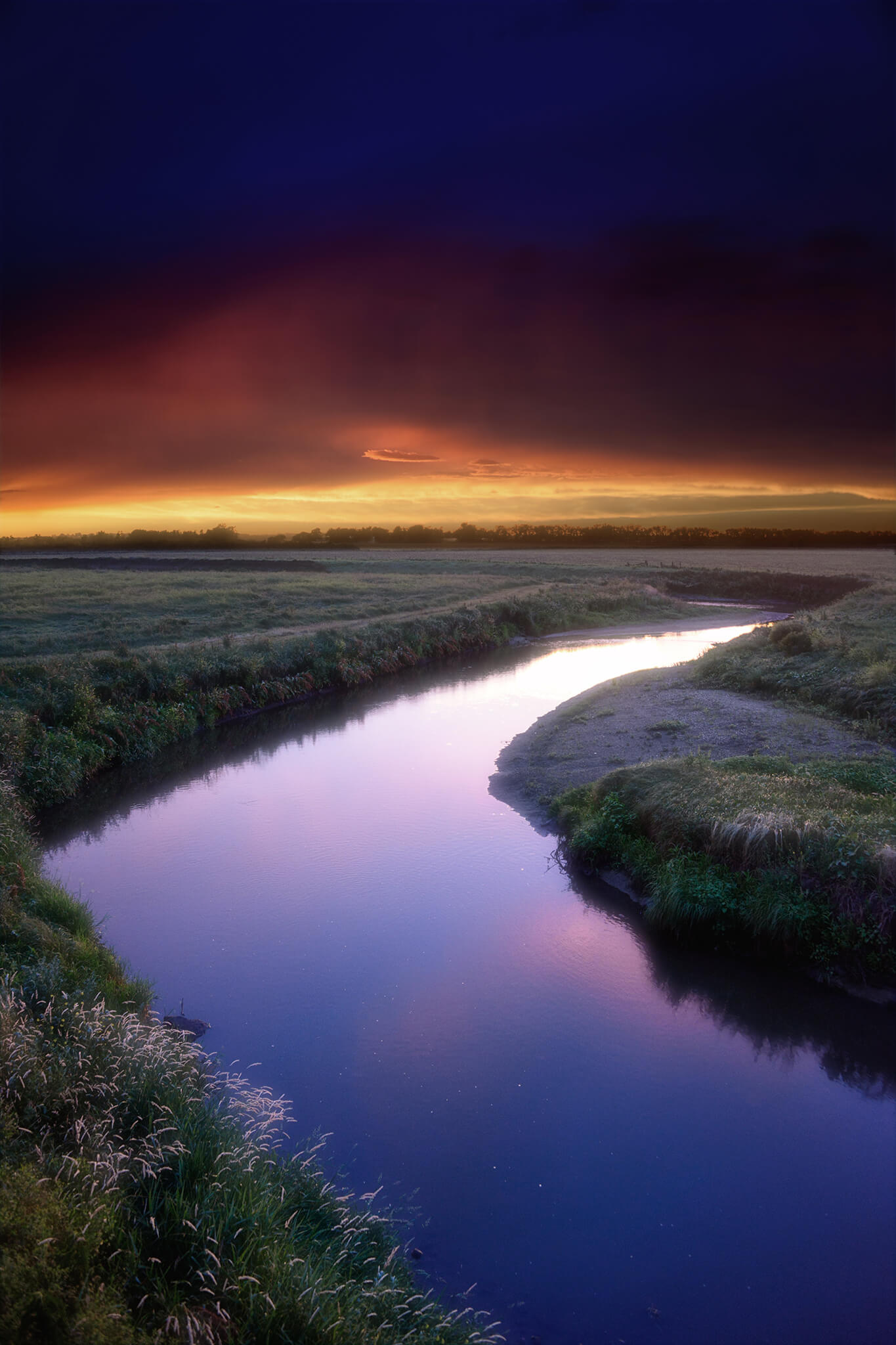 Purple reflected stream and colorful sky