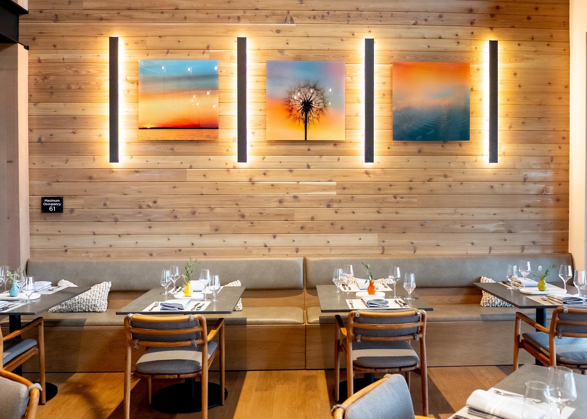 Three Grouped Acrylic Artworks on Wood Wall