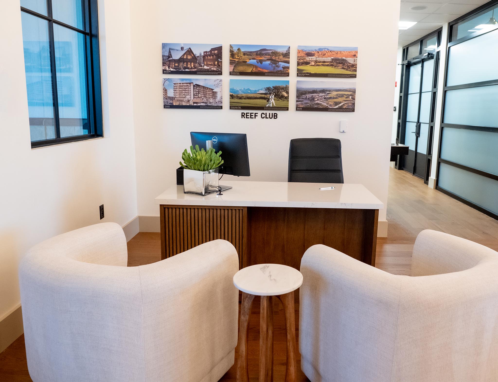 Wall with six artworks displayed