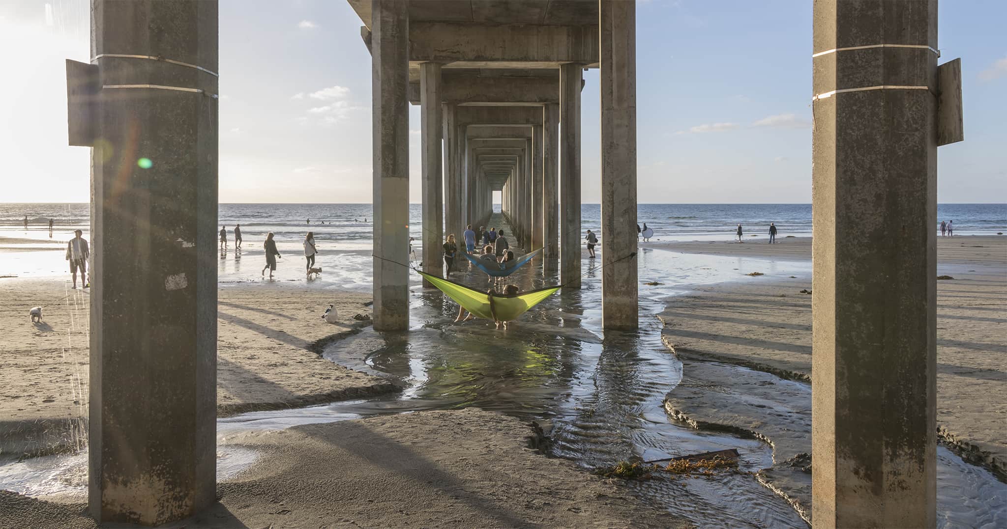 People under Scripps Pier in San Diego